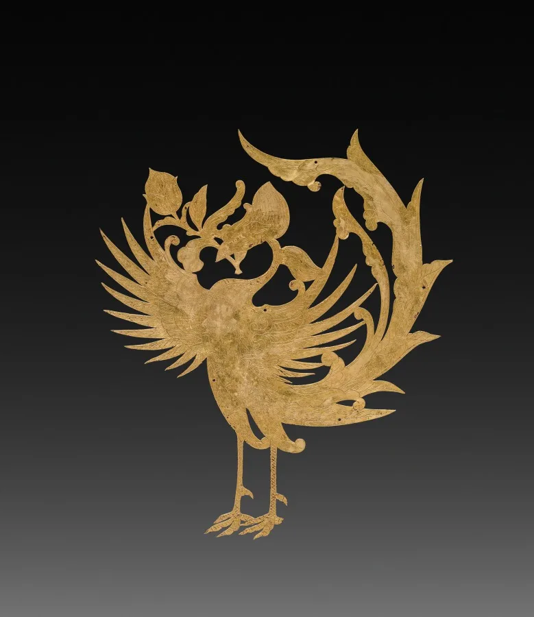 Gold sheet ornament in the form of a phoenix, chased with fine surface detail