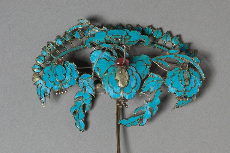 Gilded silver headdress ornament with kingfisher-feather surface and beaded detail