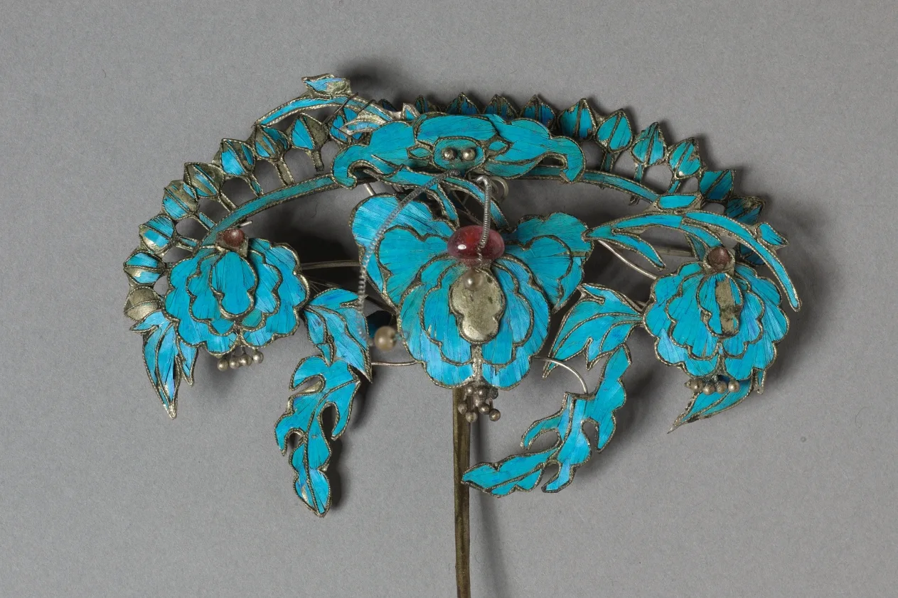 Gilded silver headdress ornament with kingfisher-feather surface and beaded detail