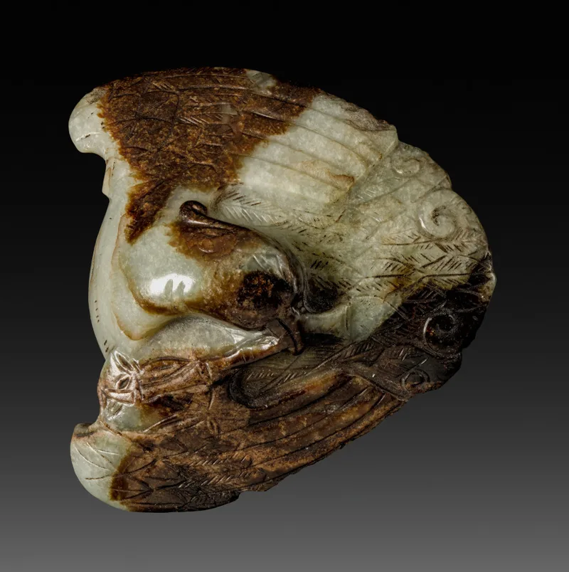 Small nephrite pendant with carved surface detail