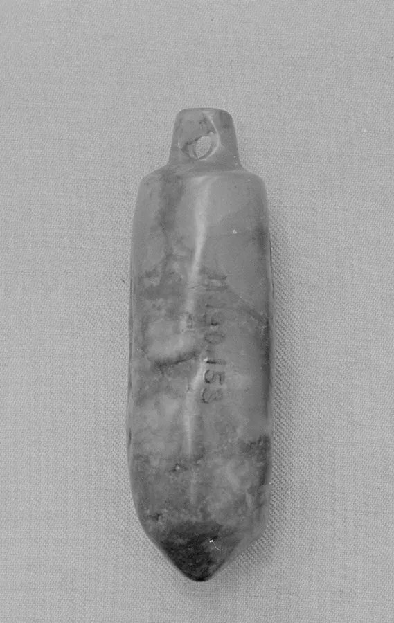 Jade (nephrite) pendant, prehistoric china, 3.8 cm high.