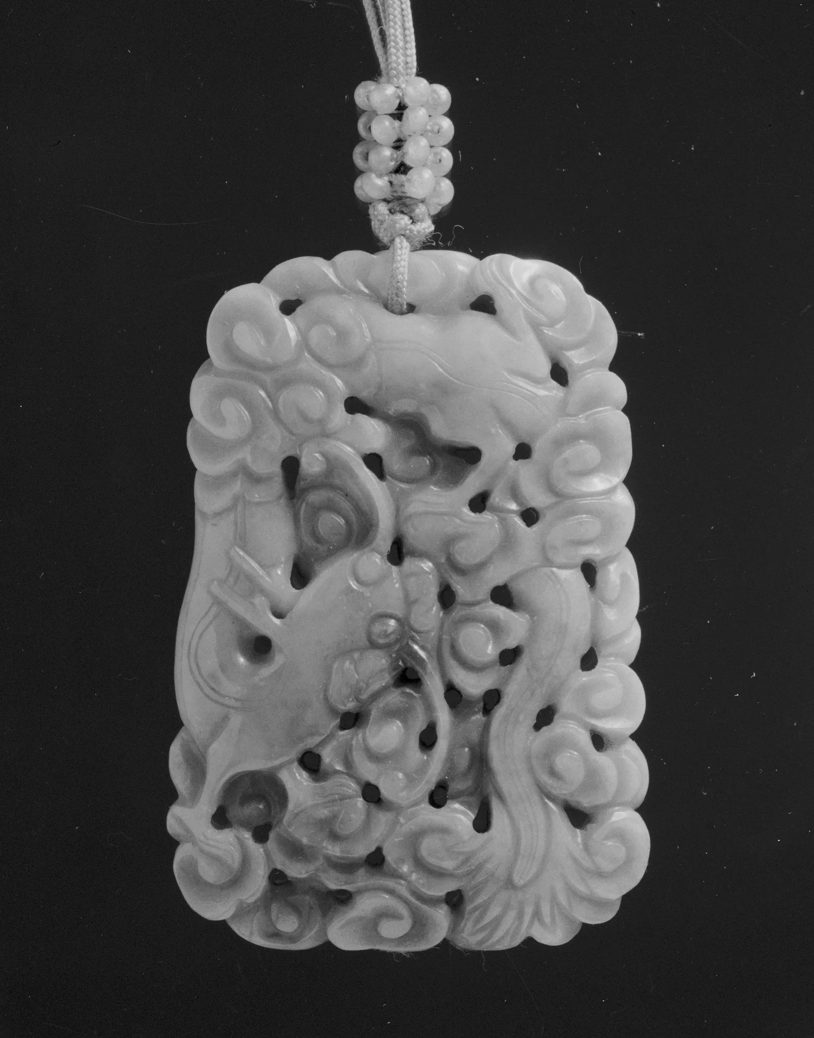 Jade (nephrite) pendant, qing dynasty, 5.2 cm high.