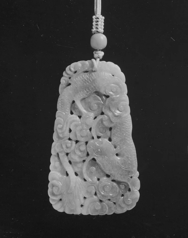 Jadeite and jade (nephrite) pendant, with dragon, qing dynasty, 7.6 cm high.
