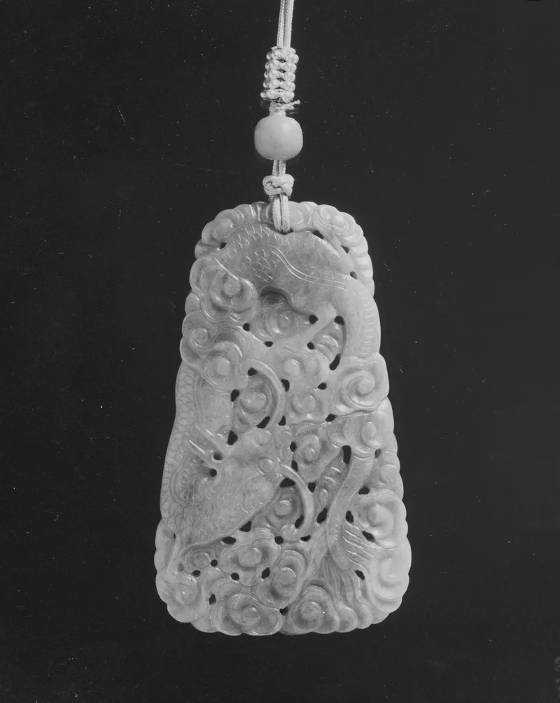 Jade (nephrite) pendant, qing dynasty, 7.6 cm high.