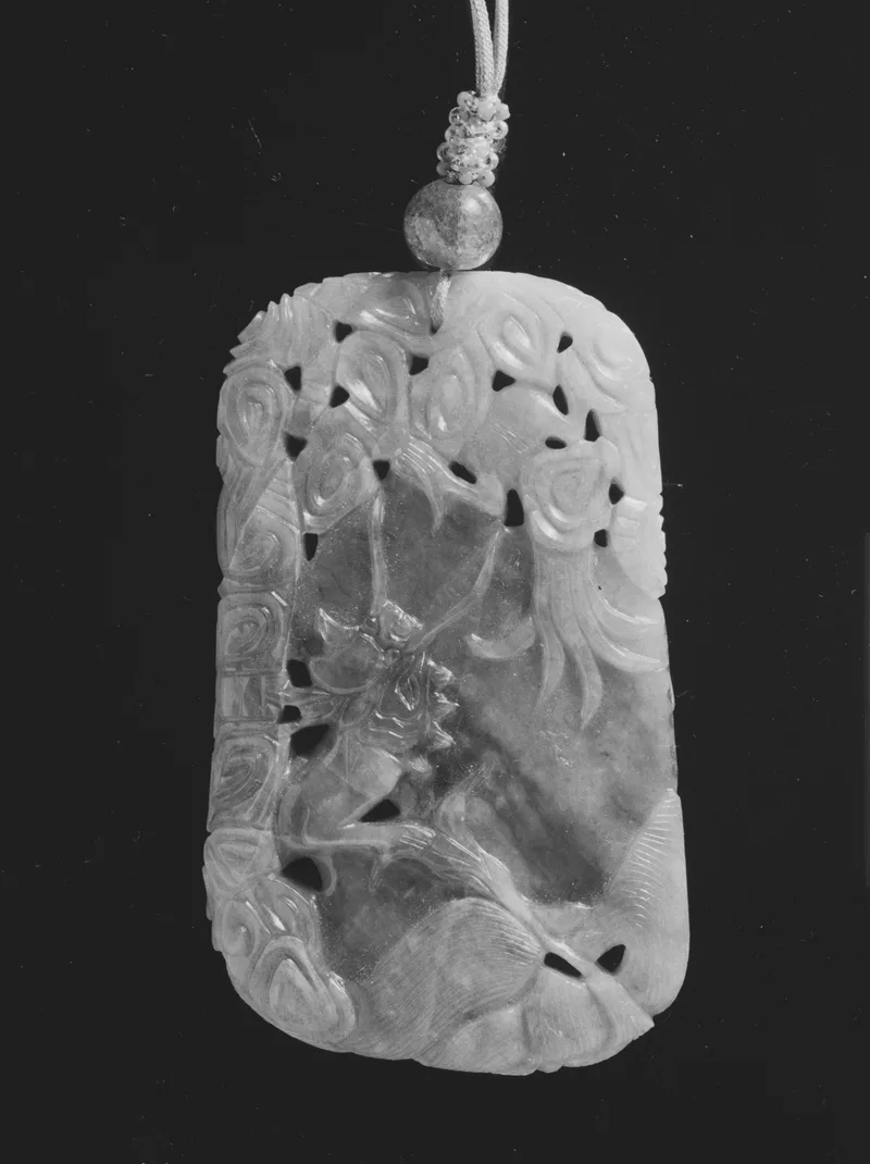 Jadeite pendant, qing dynasty, 7.9 cm long.