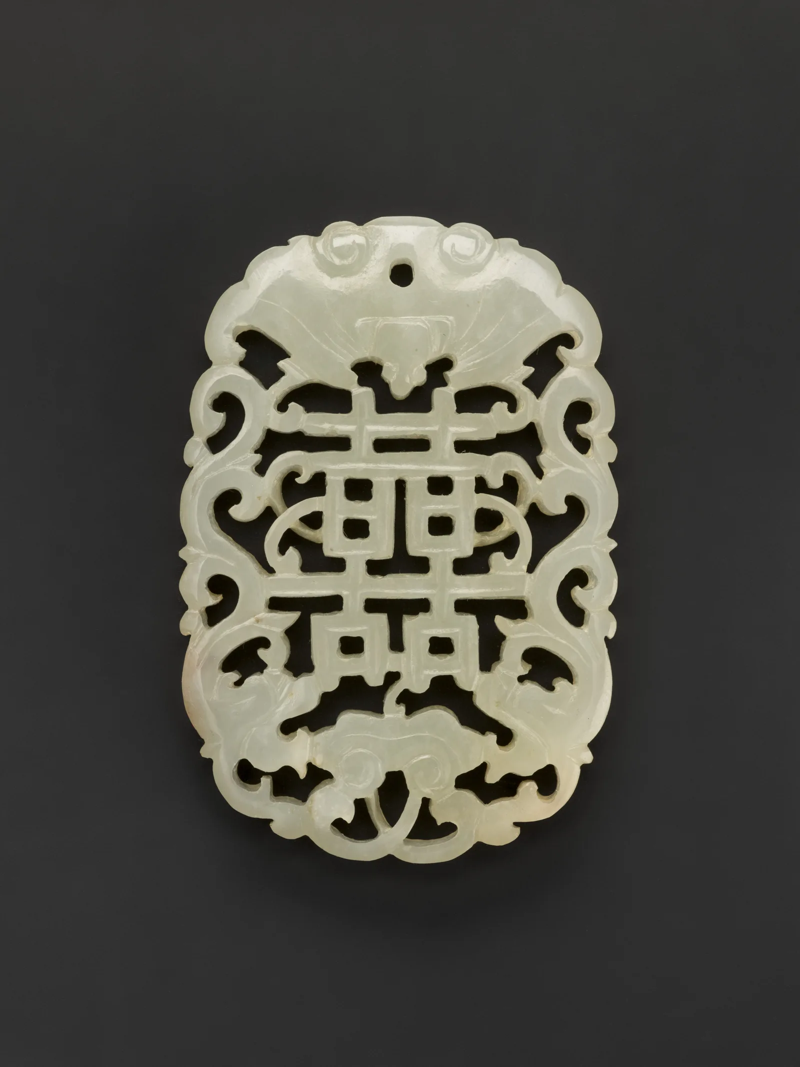 Jade (nephrite) pendant, qing dynasty, 5.6 cm high.