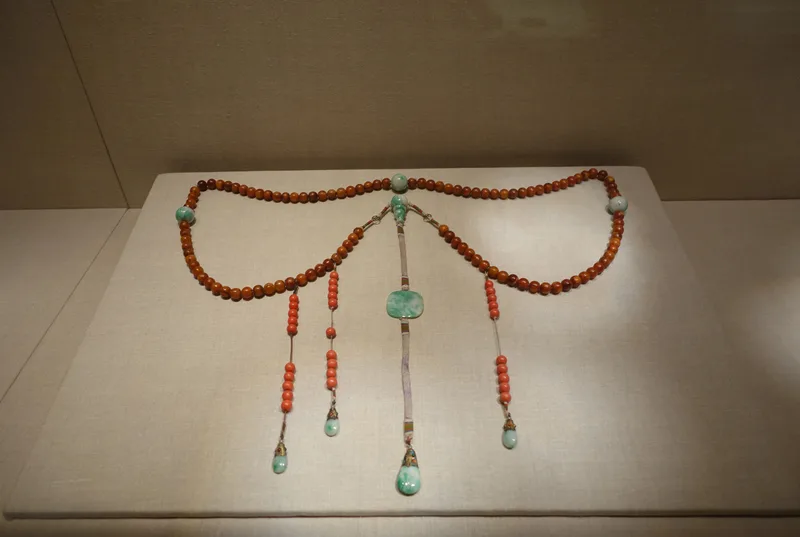 Jadeite, jade (nephrite), amber and coral necklace, qing dynasty, 104.1 cm long.
