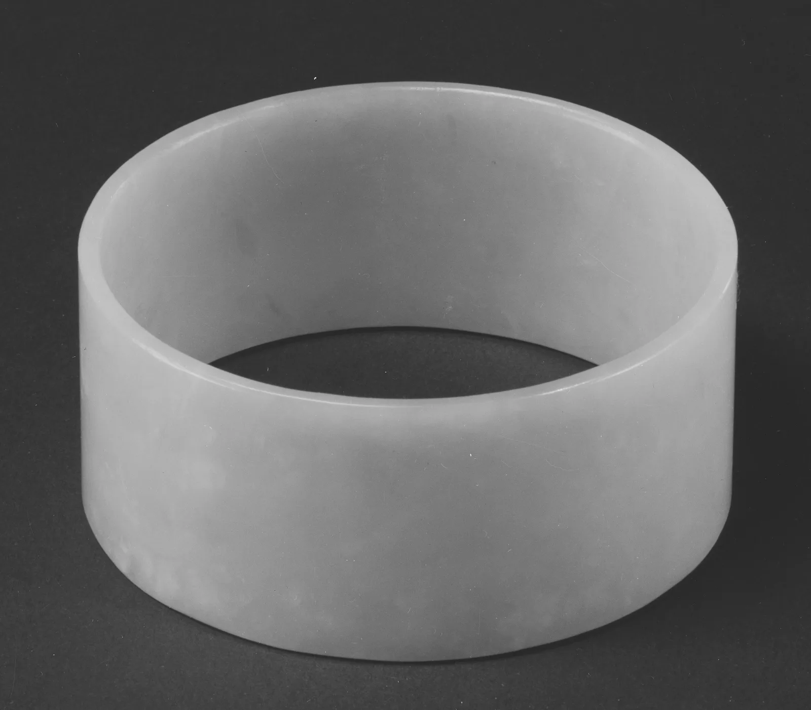 Jade (nephrite) armlet, prehistoric china, 8.6 cm across.