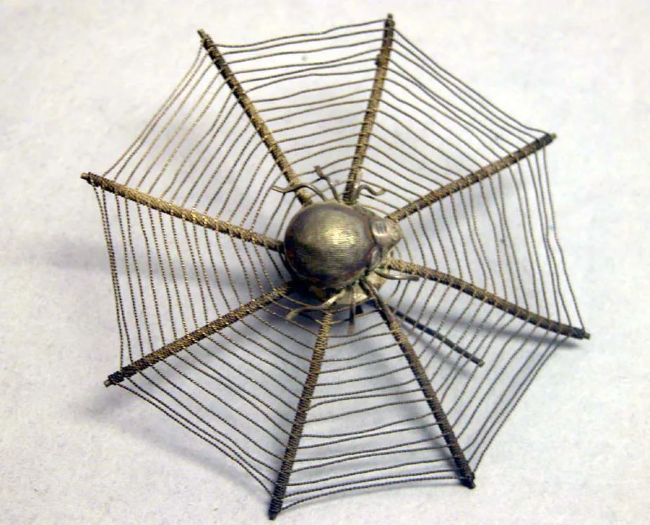 Silver hairpin, ming dynasty, 7 cm across.