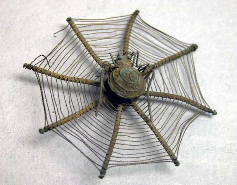 Silver hairpin, ming dynasty, 4.8 cm across.