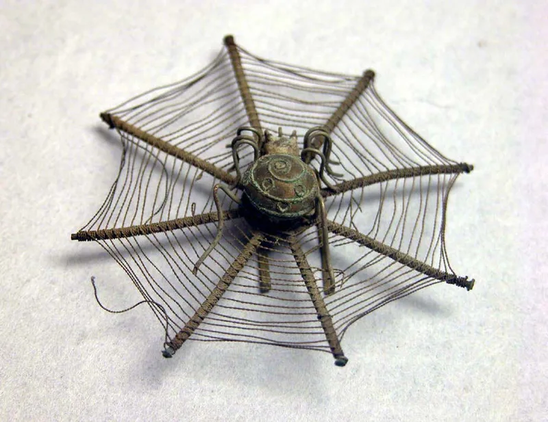 Silver hairpin, ming dynasty, 4.8 cm across.
