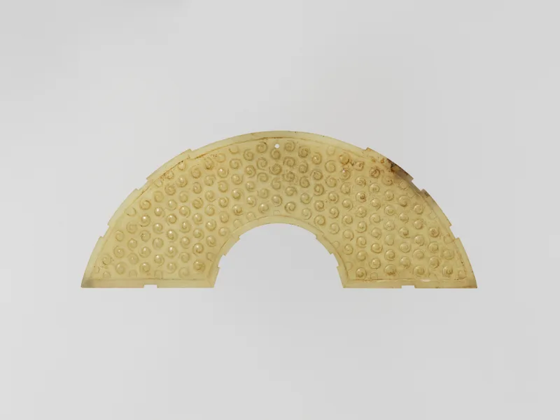 Jade (nephrite) pendant, shang and zhou dynasties, 14 cm long.