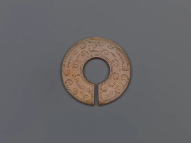 Jade (nephrite) slit ring, shang and zhou dynasties, 3.5 cm across.