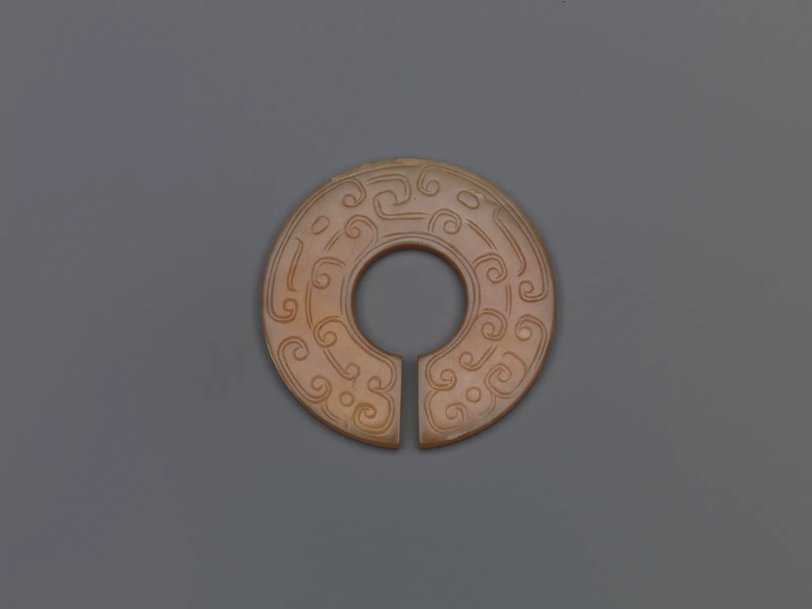 Jade (nephrite) slit ring, shang and zhou dynasties, 3.5 cm across.