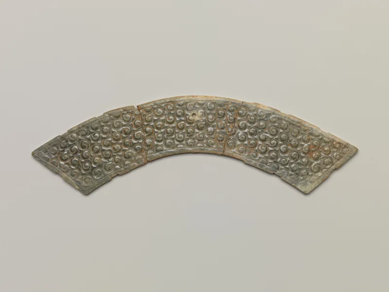 Jade (nephrite) pendant, shang and zhou dynasties, 3.8 cm high.