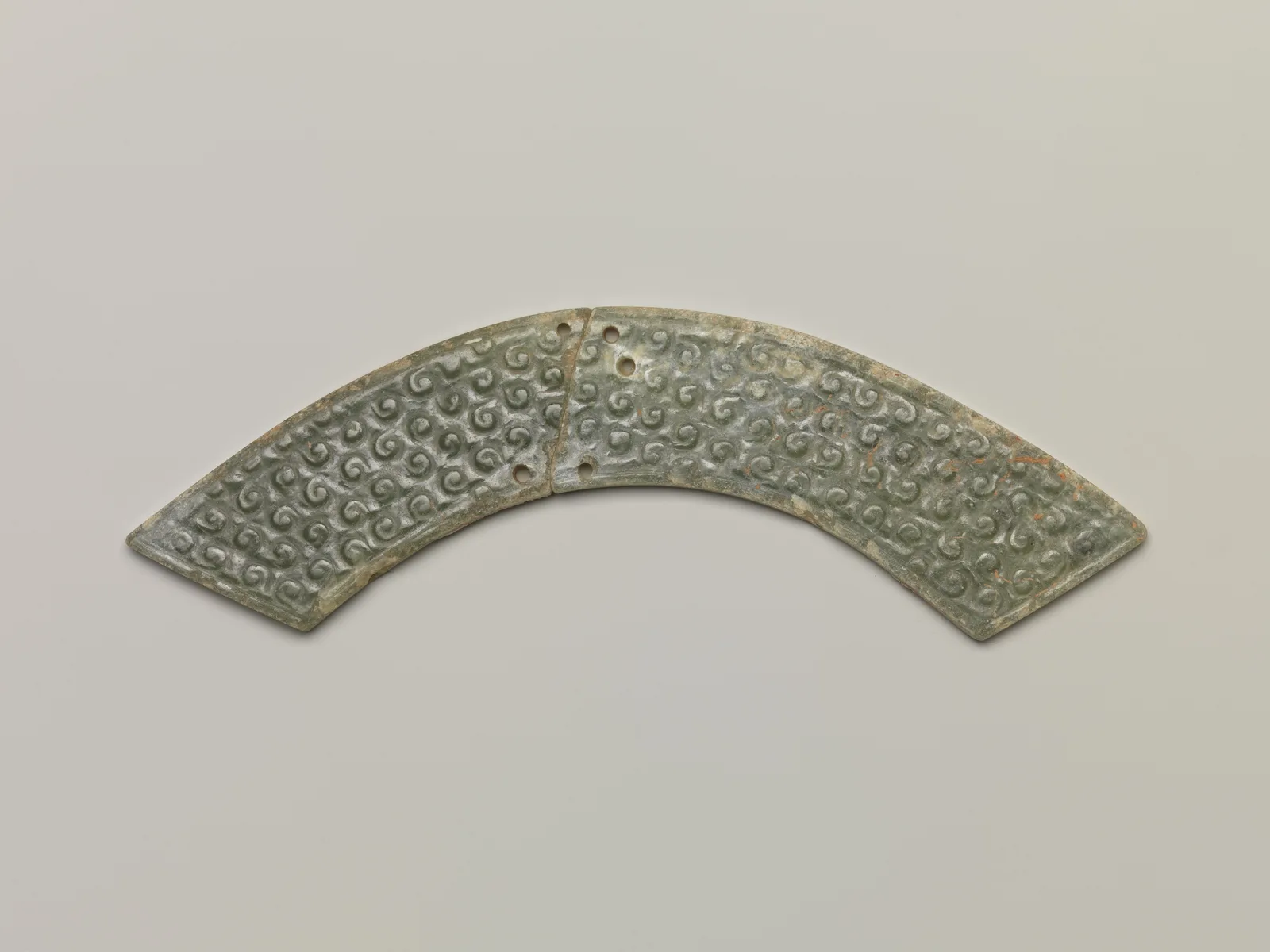 Jade (nephrite) pendant, shang and zhou dynasties, 3.5 cm high.