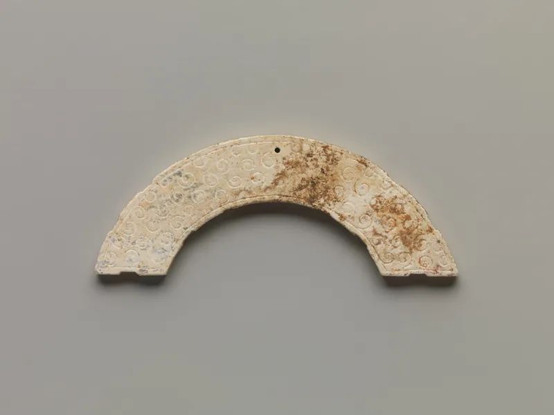 Jade (nephrite) pendant, shang and zhou dynasties, 2.2 cm high.